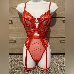Red lace bodysuit with garter straps. Small